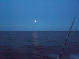 moon set over holden beach